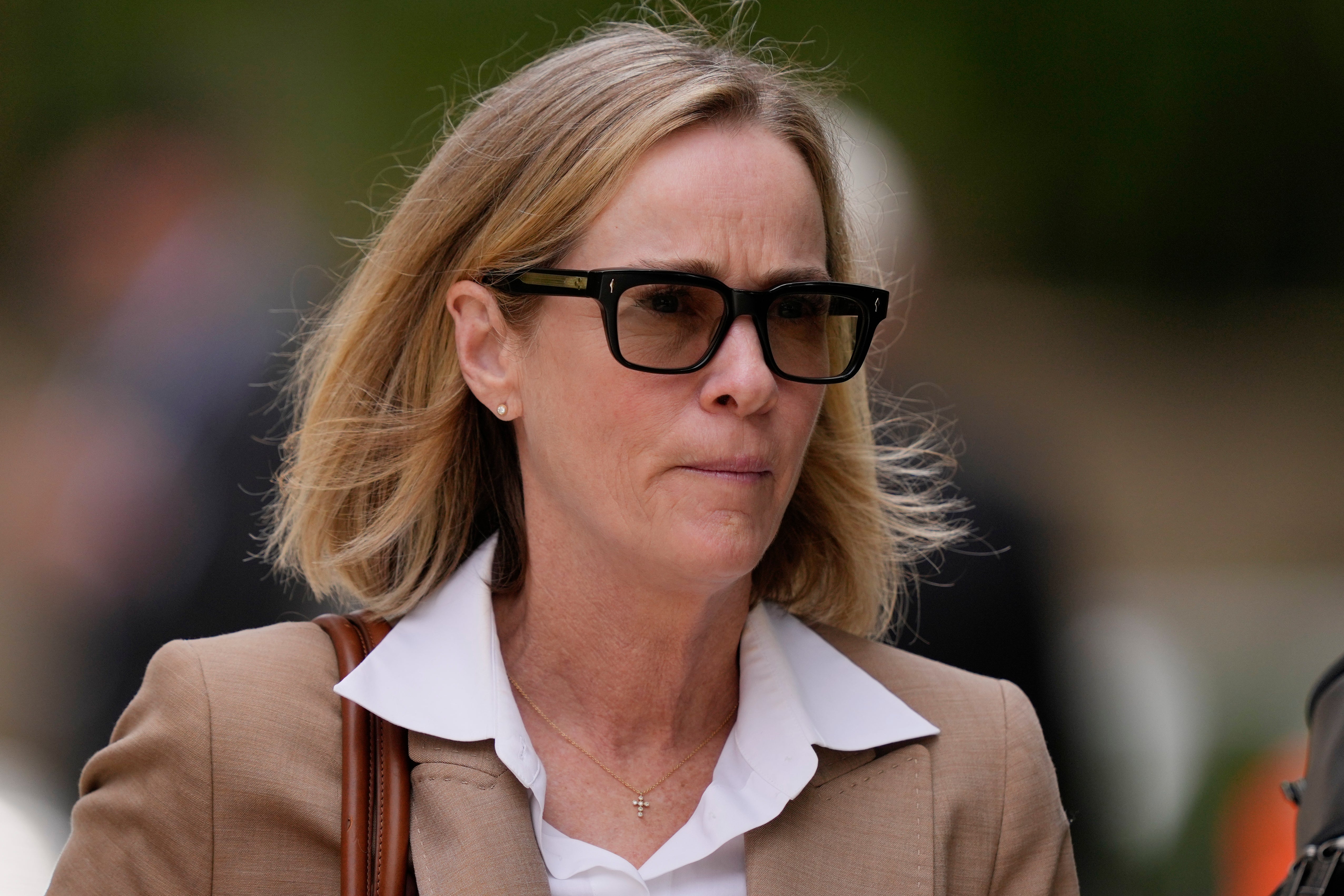 Kathleen Buhle, Hunter Biden’s ex-wife, leaves court on 5 June after speaking about how she found drugs at their DC home