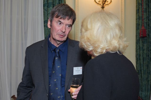 Queen Camilla with Sir Ian Rankin (Yui Mok/PA)