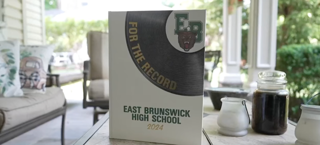<p>The 2024 East Brunswick High School yearbook, which school district officials are investigating after a Jewish student group’s photo was replaced.</p>