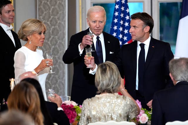 <p>French President Emmanuel Macron, from right, President Joe Biden and Brigitte Macron toast during a state dinner, Saturday, June 8, 2024 at the Elysee Palace, in Paris</p>