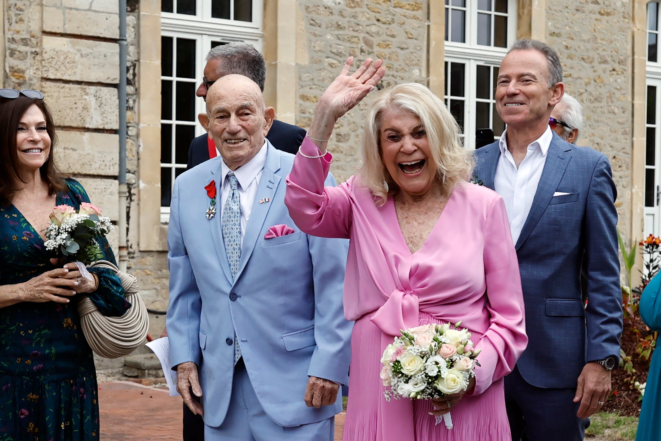 Terens and Swerlin celebrate their wedding at the town hall of Carentan-les-Marais in Normandy, northwestern France, on Saturday, June 8, 2024