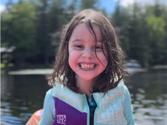 Lucy Morgan, 6, enjoying a kayak ride with her family. The little girl was killed in a freak accident when a badminton racquet broke and pierced her skull in June 2024