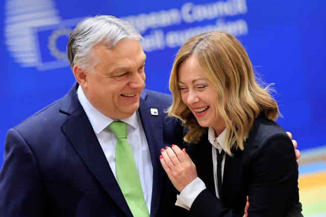 <p>Hungary's prime minister Viktor Orban, left, speaks with Italy's premier Giorgia Meloni during a round table meeting at an EU Summit in Brussels. Right and far-right parties were the big winners in elections this week </p>
