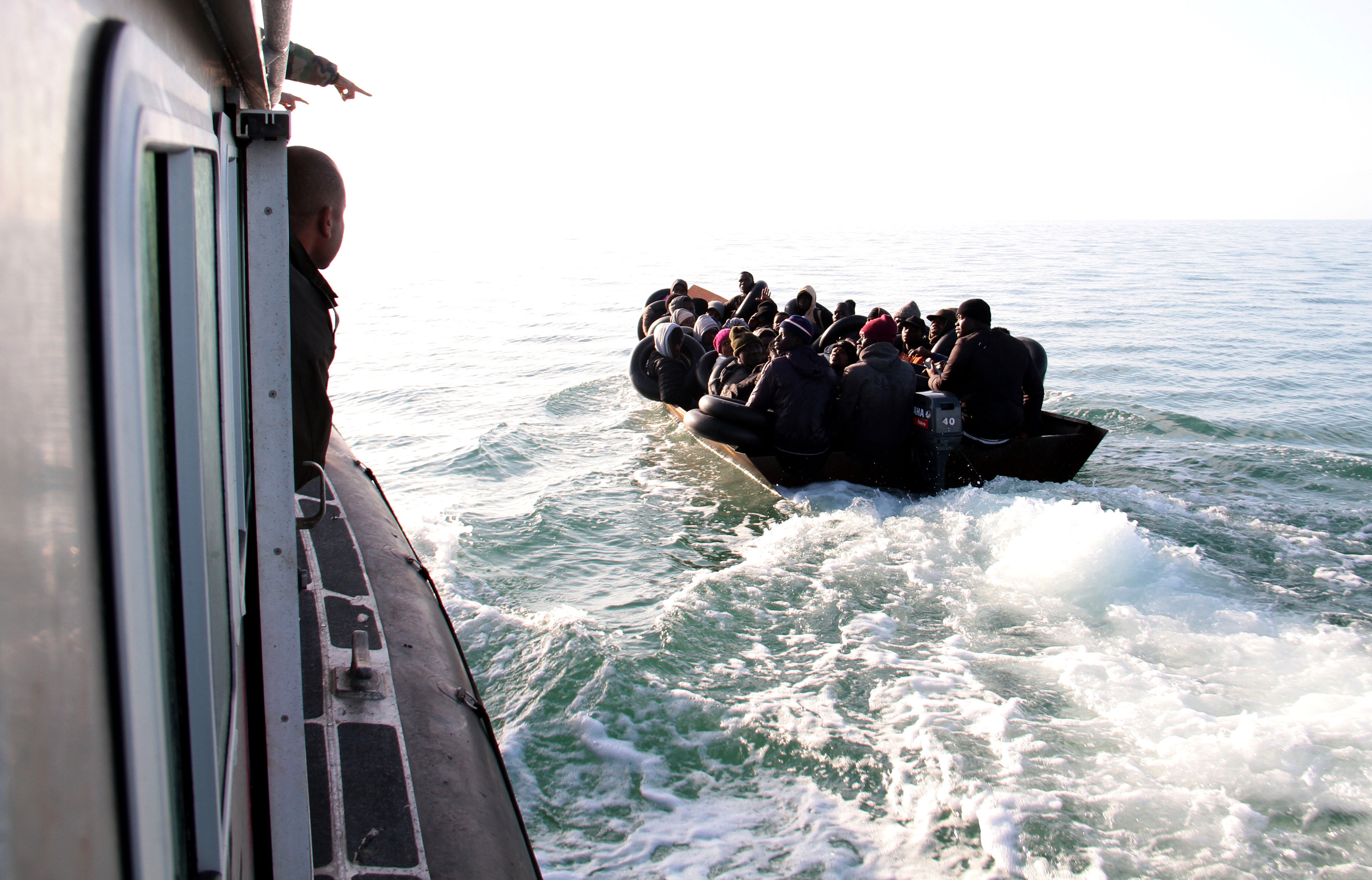 Migrants are stopped by Tunisian Maritime National Guard at sea during an attempt to get to Italy last year