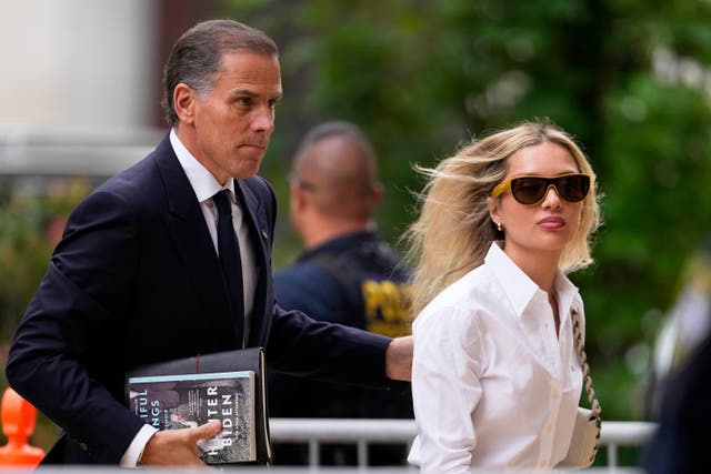 <p>Hunter Biden, left, arrives at federal court with his wife, Melissa Cohen Biden, on June 6, in Wilmington, Delaware </p>
