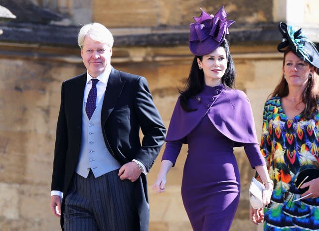 <p>Charles Spencer, 9th Earl Spencer (L) with his third wife, Karen Spencer, arriving for the wedding ceremony of Prince Harry, and Meghan Markle at St George's Chapel, Windsor Castle</p>