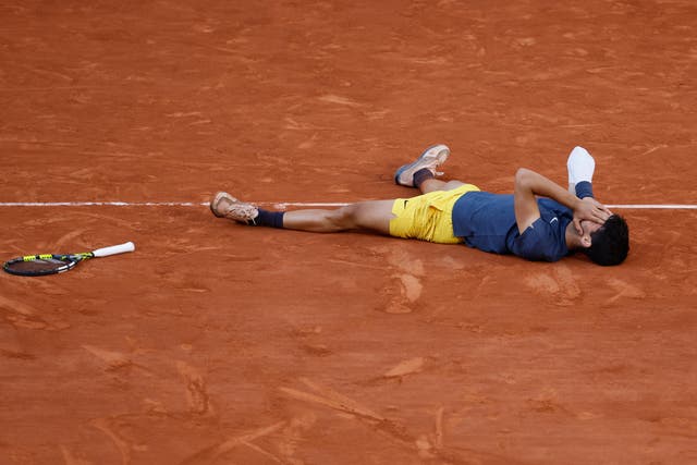 Carlos Alcaraz won a first French Open title on Sunday (Jean-Francois Badias/AP)