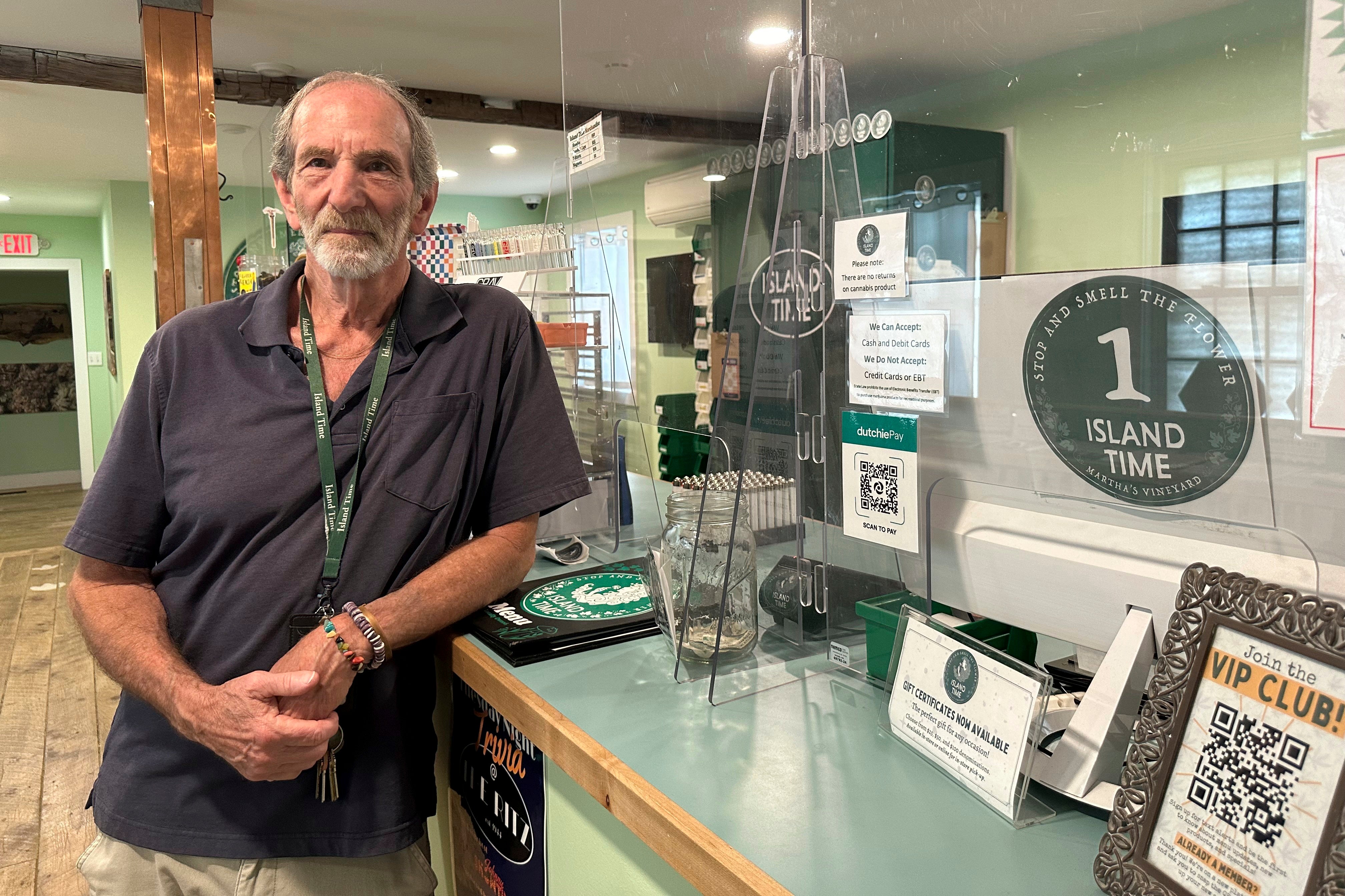 Geoff Rose, owner of the Island Time cannabis dispensary, poses in his store on June 3, 2024