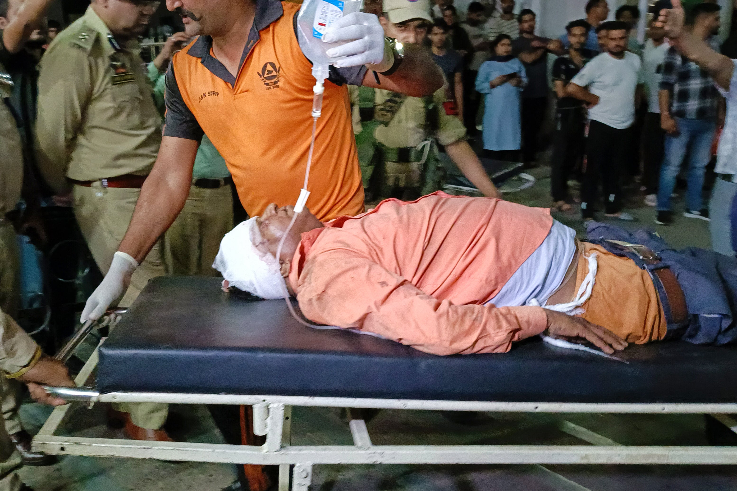 <p>A wounded survivor of the attack in Reasi arrives at a hospital in Jammu</p>