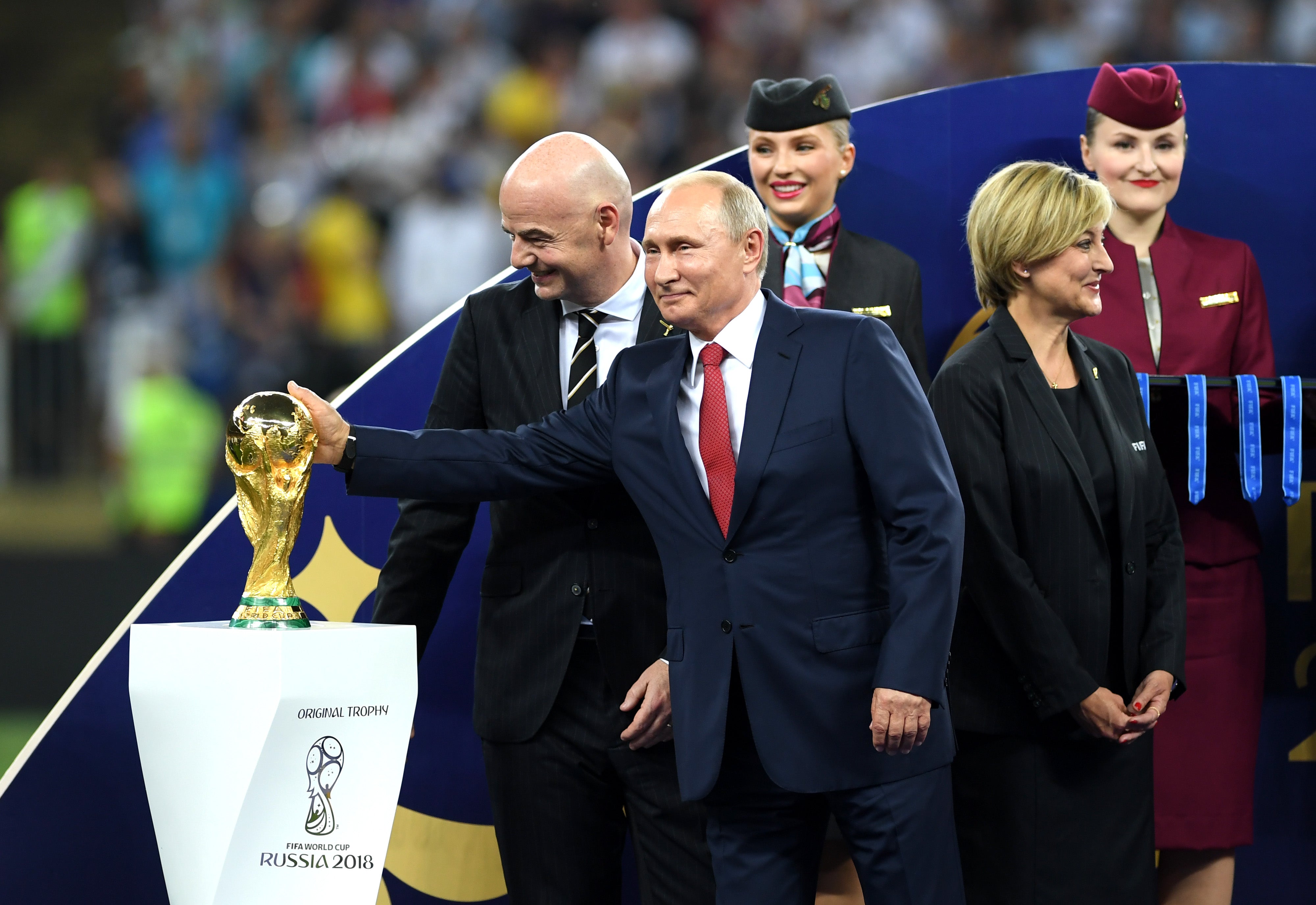President of Russia Vladimir Putin touches the World Cup