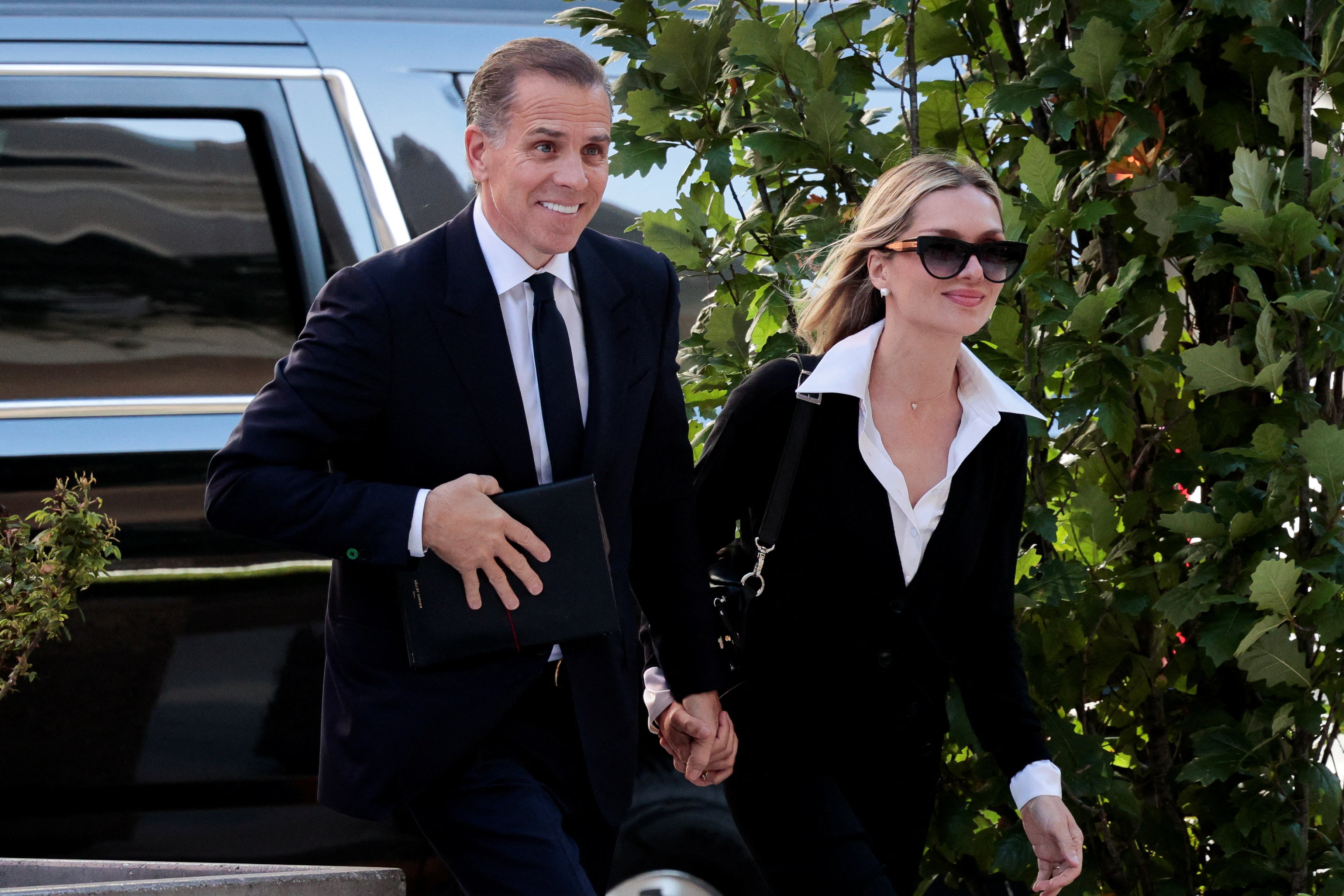 Hunter Biden, son of U.S. President Joe Biden, arrives with his wife Melissa Cohen Biden at the federal court for his trial on criminal gun charges, in Wilmington, Delaware, U.S., June 10, 2024.