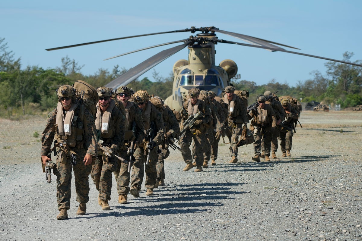 US and Filipino forces end war drills that tested their endurance in brutal heat and shifty weather