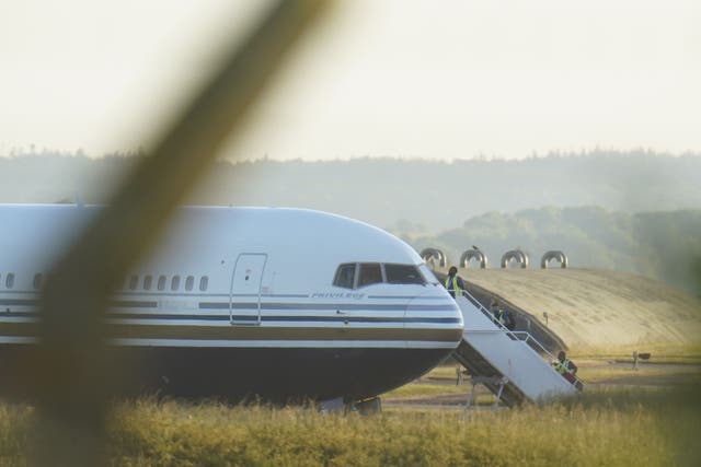 A Boeing 767 aircraft at MoD Boscombe Down, near Salisbury, which was believed to be the plane set to take asylum seekers from the UK to Rwanda in June 2022 (PA)