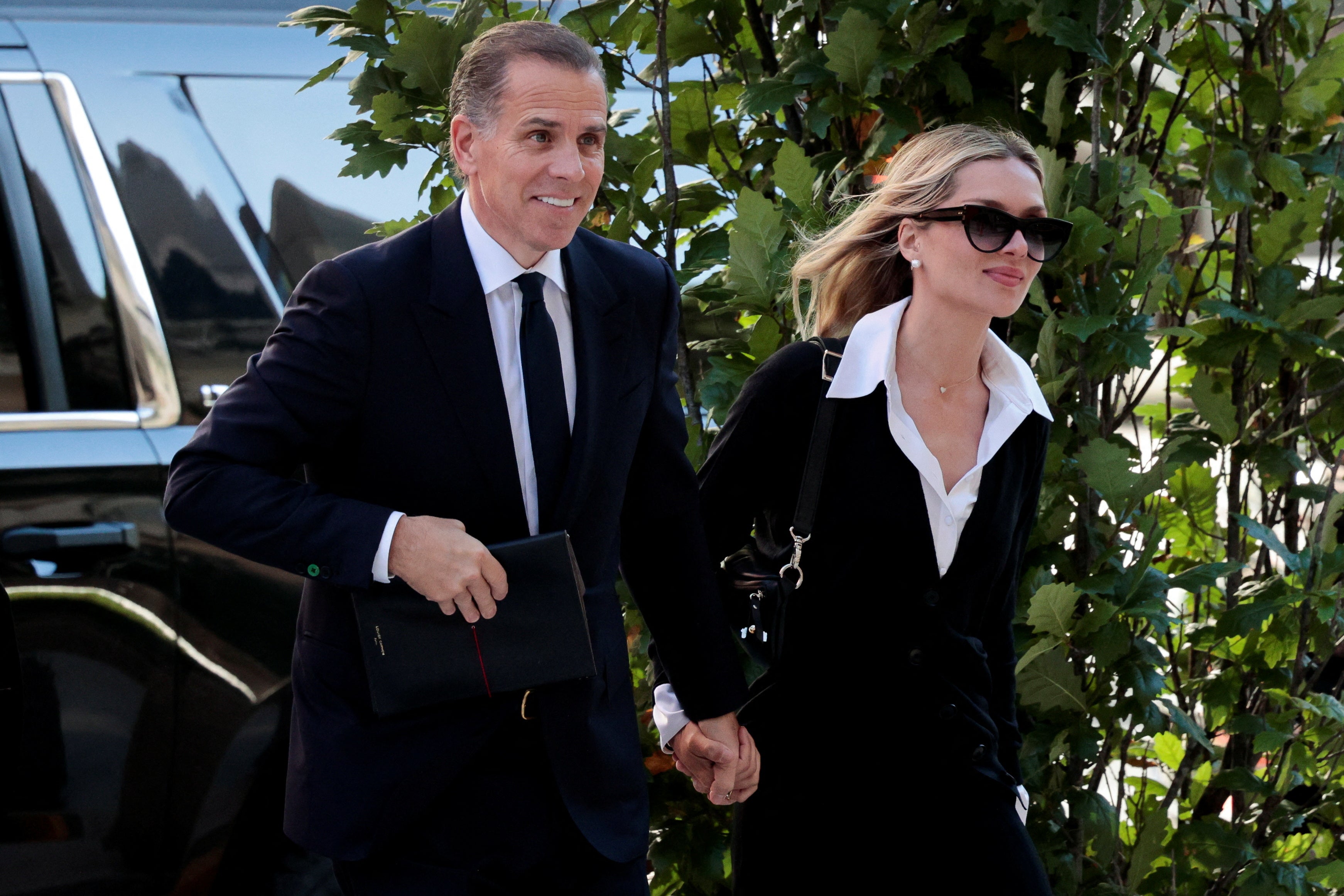 Hunter Biden, son of U.S. President Joe Biden, arrives with his wife Melissa Cohen Biden at the federal court for his trial on criminal gun charges, in Wilmington, Delaware, U.S., June 10, 2024