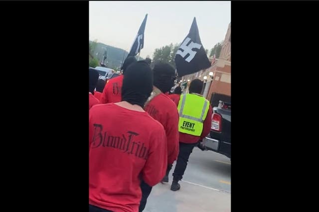 <p>A neo-Nazi group displayed a Nazi flag on the steps of South Dakota’s state capitol as they held rallies in the state. </p>