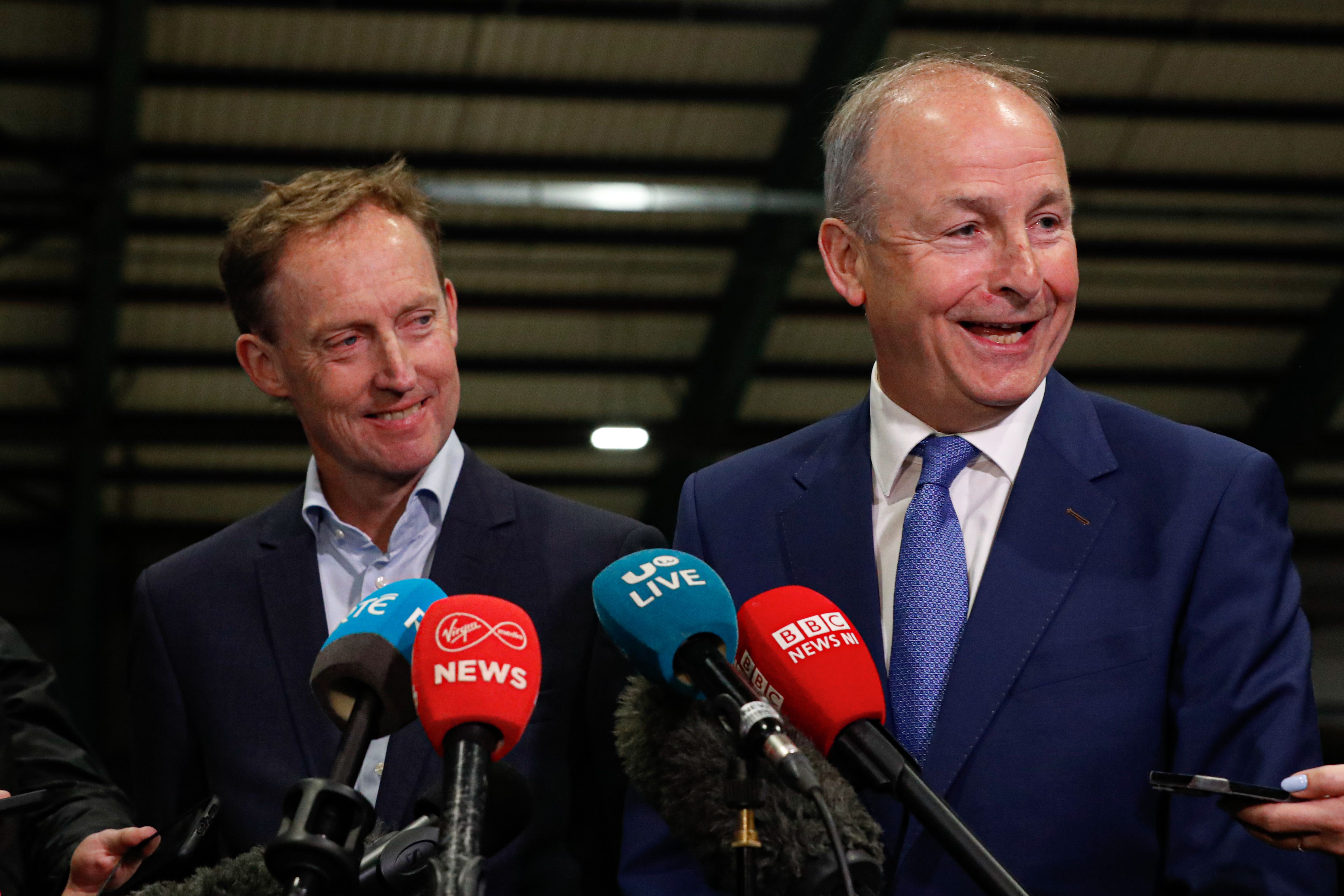 Fianna Fail election candidate Barry Andrews (left) and Tanaiste Micheal Martin at the Royal Dublin Society during the count for the European elections (Damien Storan/PA)