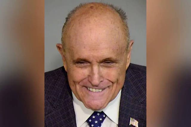 <p>Rudy Giuliani poses for a mugshot weeks after pleading not guilty in an Arizona election interference case</p>