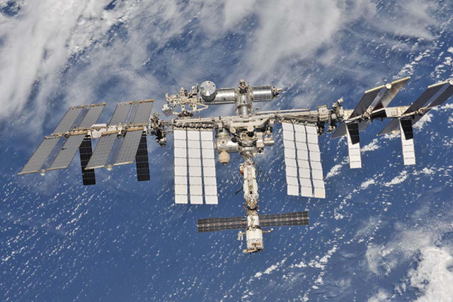 <p>International Space Station orbiting the Earth</p>