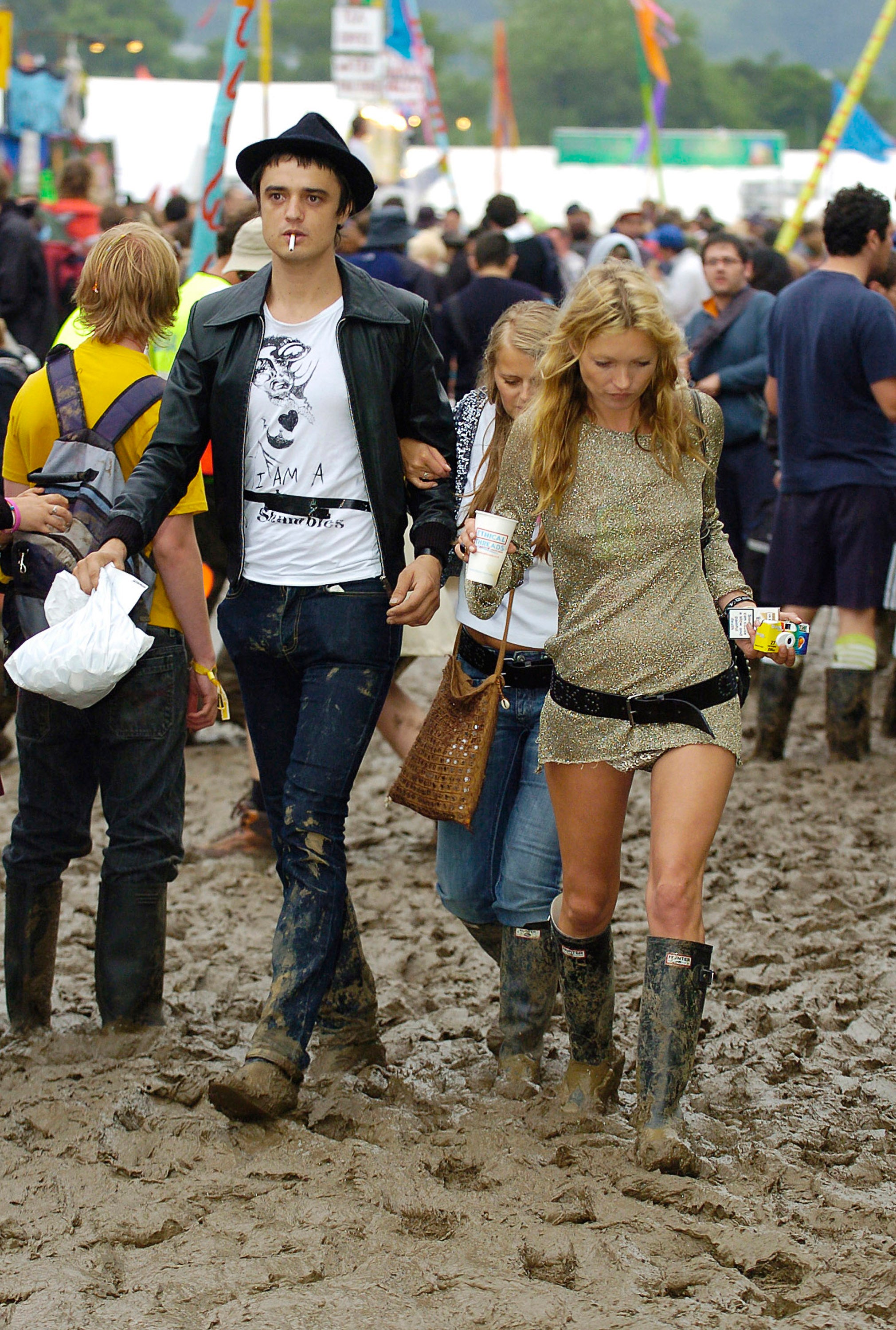 Pete Doherty of The Libertines and model Kate Moss braving the mud in 2005