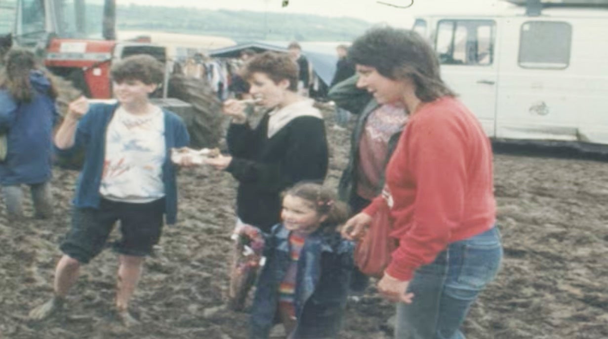 The mud didn’t stop people from dancing and smiling in 1982