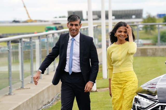 <p>Prime minister Rishi Sunak and his wife Akshata Murty arrive at Silverstone racetrack for the launch of the Conservative Party’s general election manifesto</p>