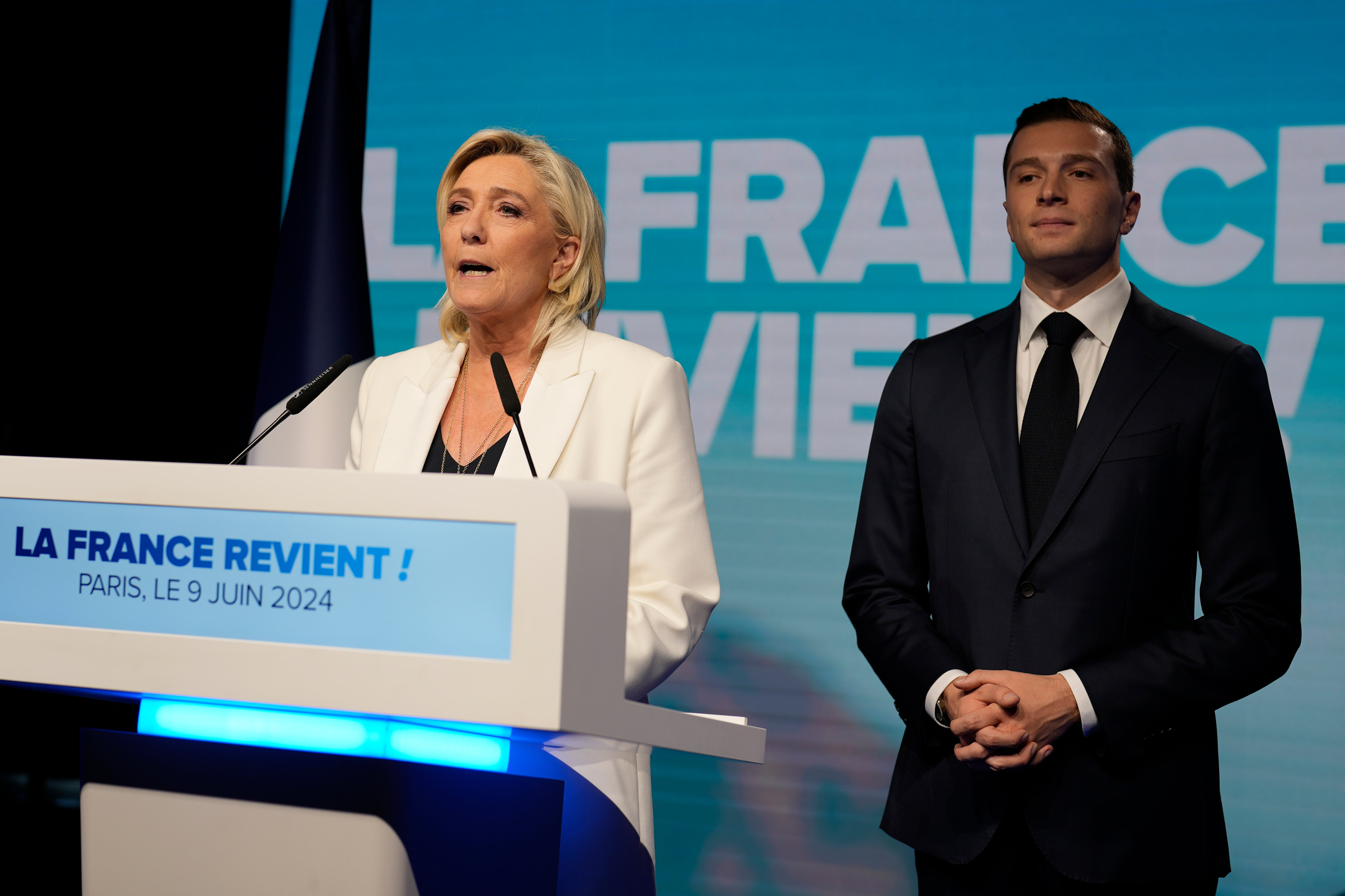 Marine Le Pen and Jordan Bardella in Paris on Sunday