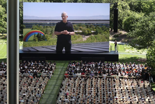 <p>Apple CEO Tim Cook delivers remarks at the start of the Apple Worldwide Developers Conference (WWDC) on June 10, 2024 in Cupertino, California</p>