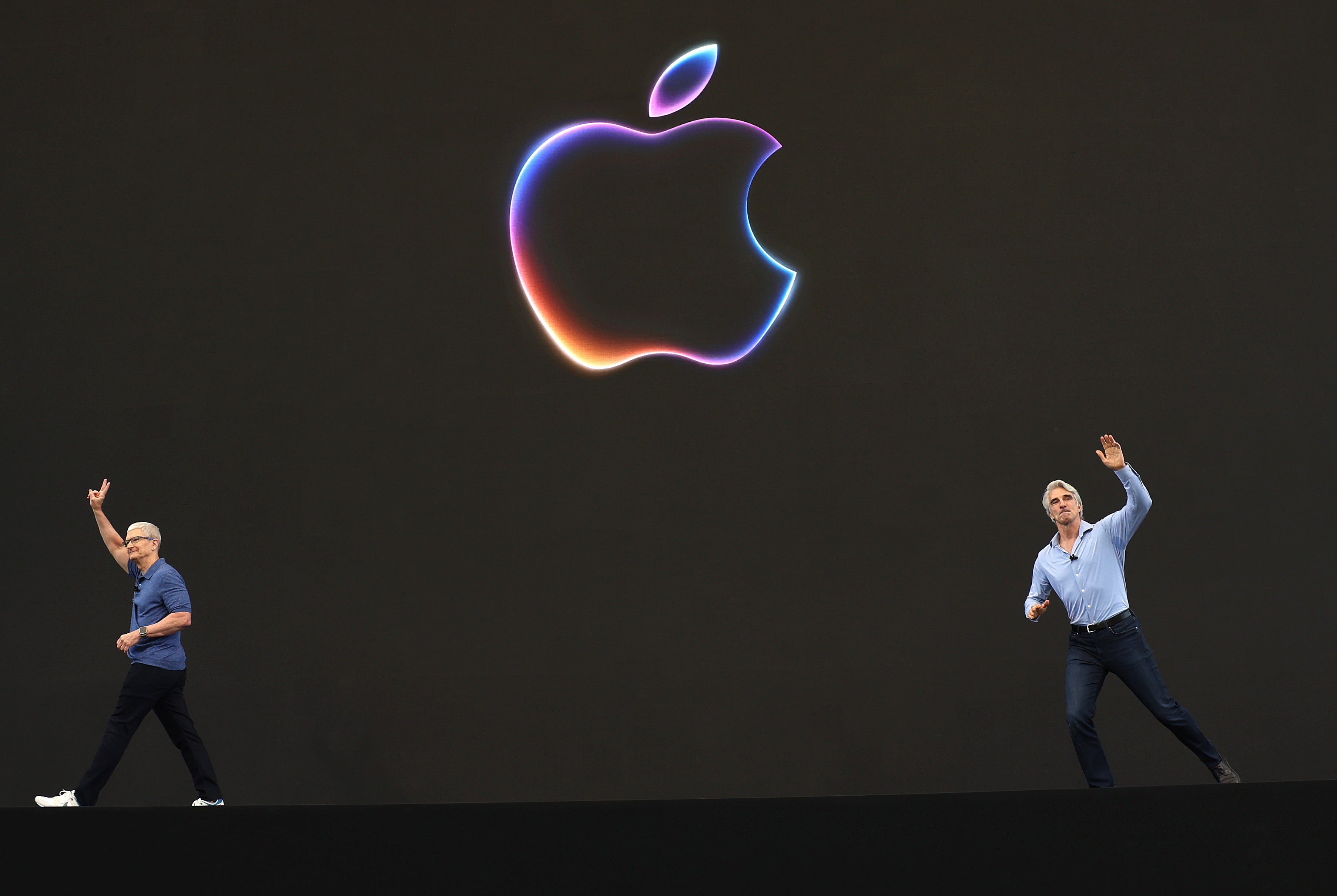 Apple CEO Tim Cook (left) and senior vice-president of software engineering Craig Federighi greet attendees at the start of the Apple Worldwide Developers Conference earlier this week