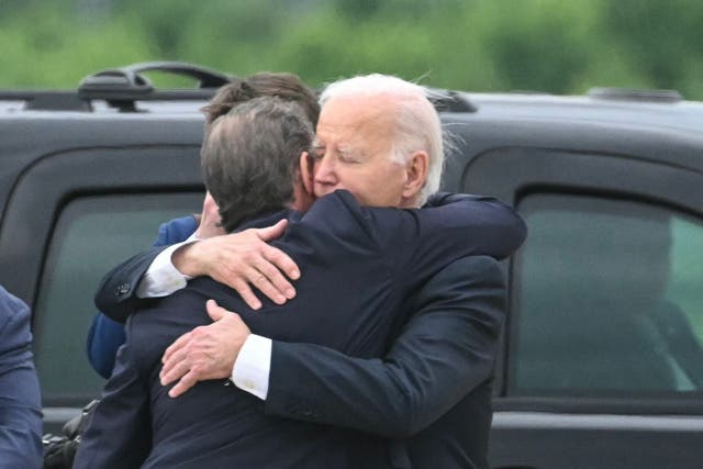 <p>US President Joe Biden hugs his son Hunter Biden upon arrival at Delaware Air National Guard Base in New Castle, Delaware, on June 11, 2024</p>