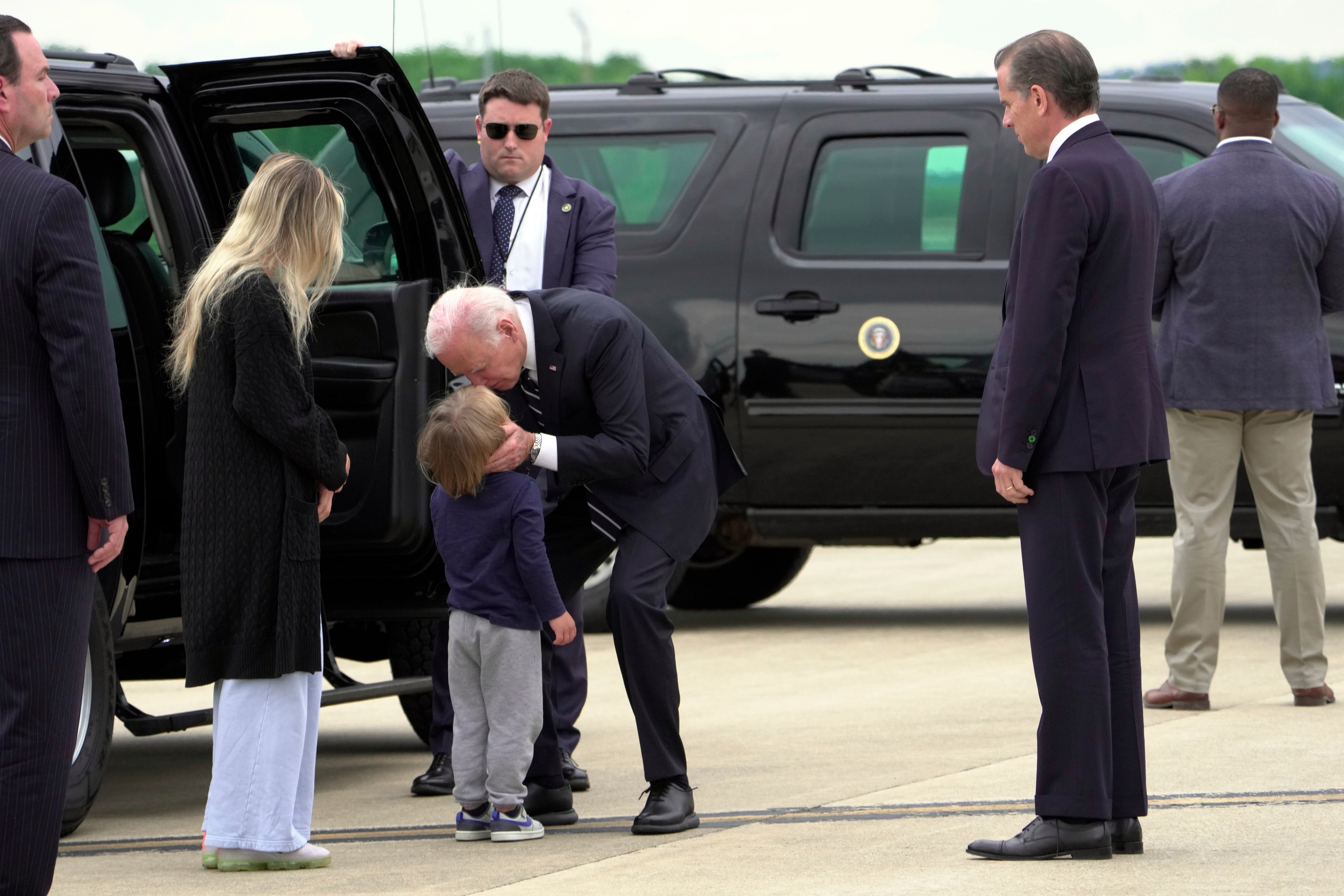 President Joe Biden greets his grandson Beau Biden as Hunter Biden and wife Melissa Cohen Biden watch, at Delaware Air National Guard Base in Delaware on Tuesday, June 11, 2024