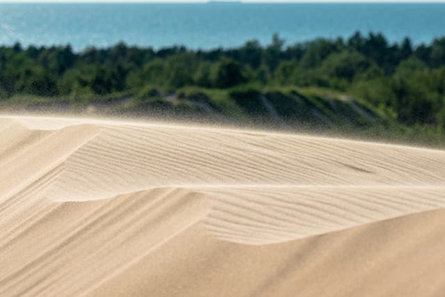 <p> A 12-year-old boy had to be rescued after a hole he and his brother dug collapsed on him at the sand dunes at Silver Lake State Park in Mears, Michigan</p>