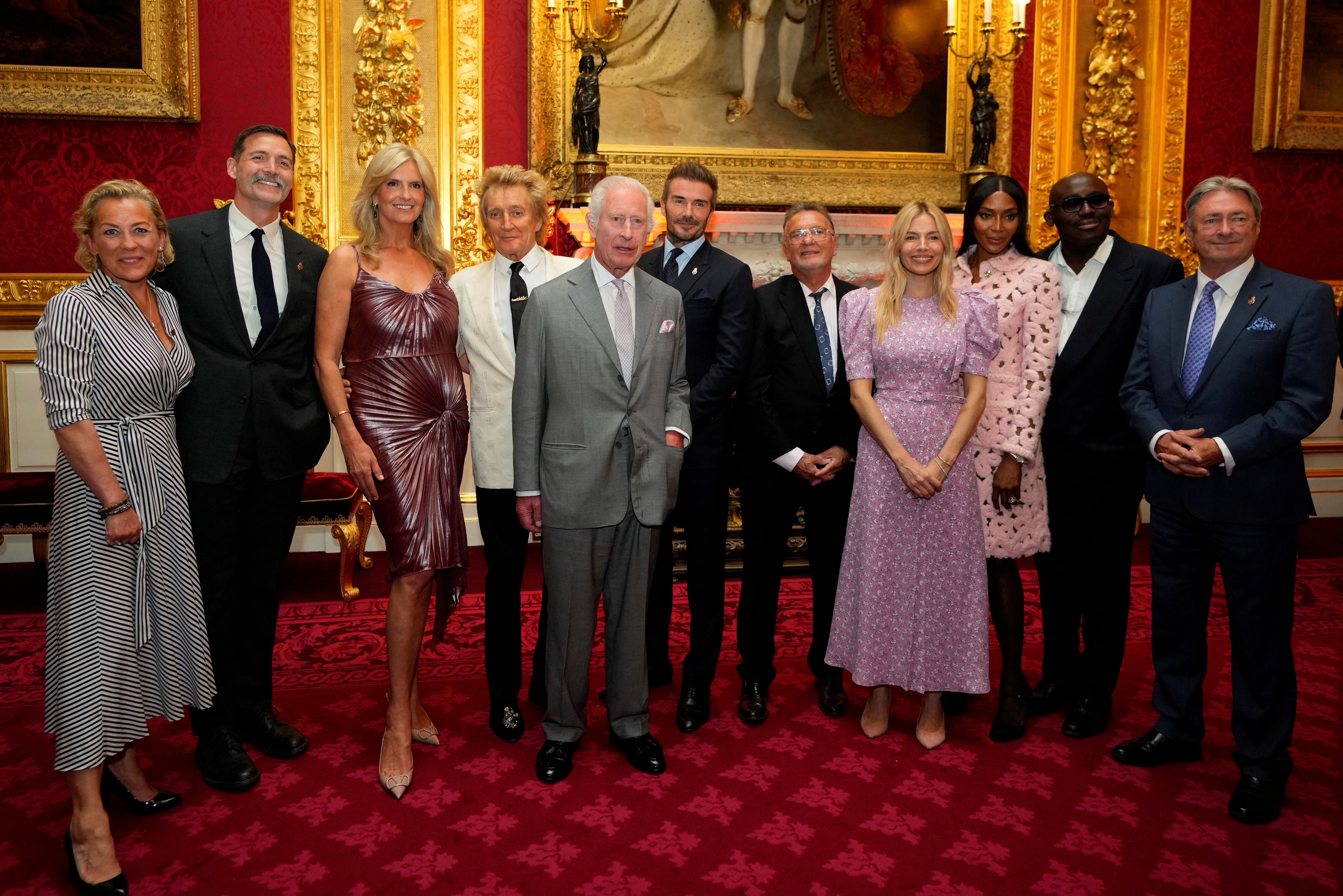 King Charles poses with a host of celebrities in St James Palace