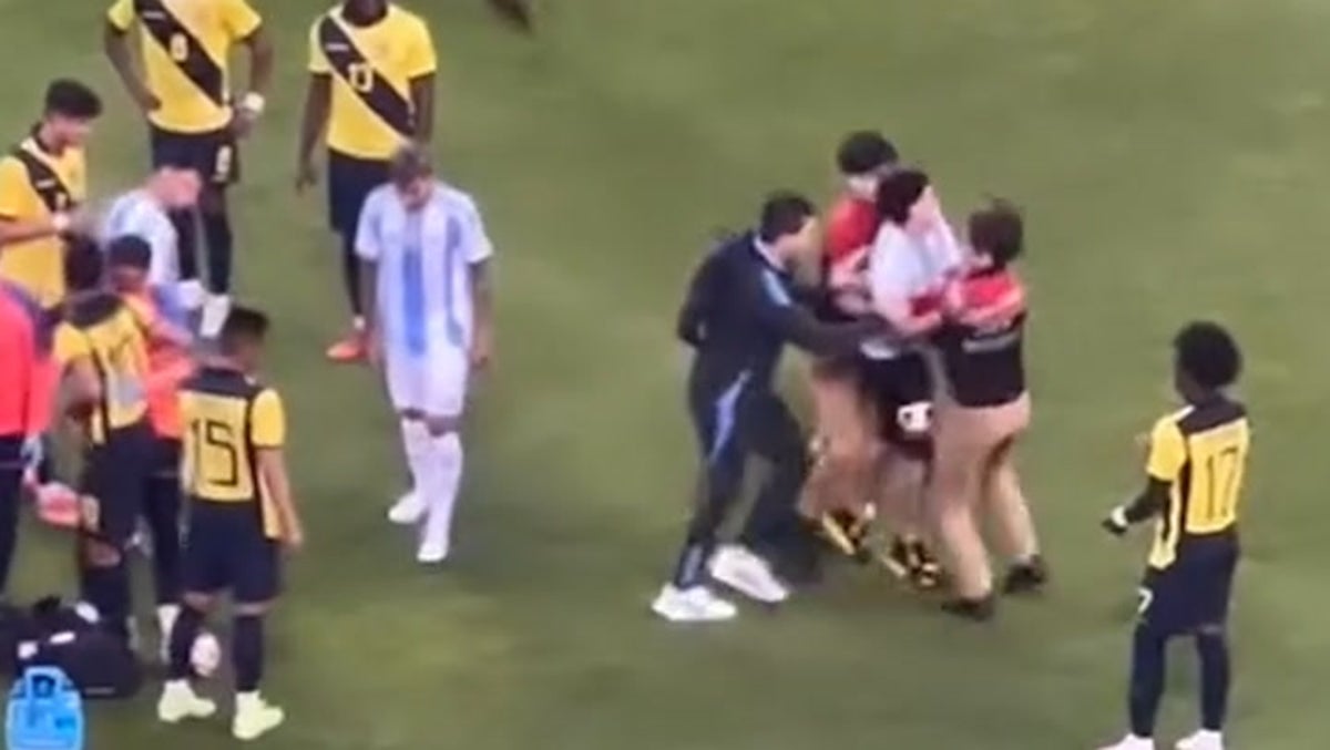 Pitch invader dragged away from Lionel Messi during Argentina’s friendly vs Ecuador