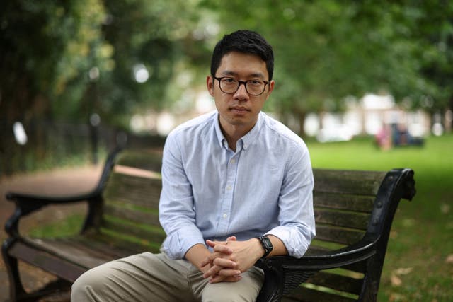 <p>In this picture taken on 18 August 2023, former Hong Kong legislator and pro-democracy activist Nathan Law poses for a photograph in London</p>