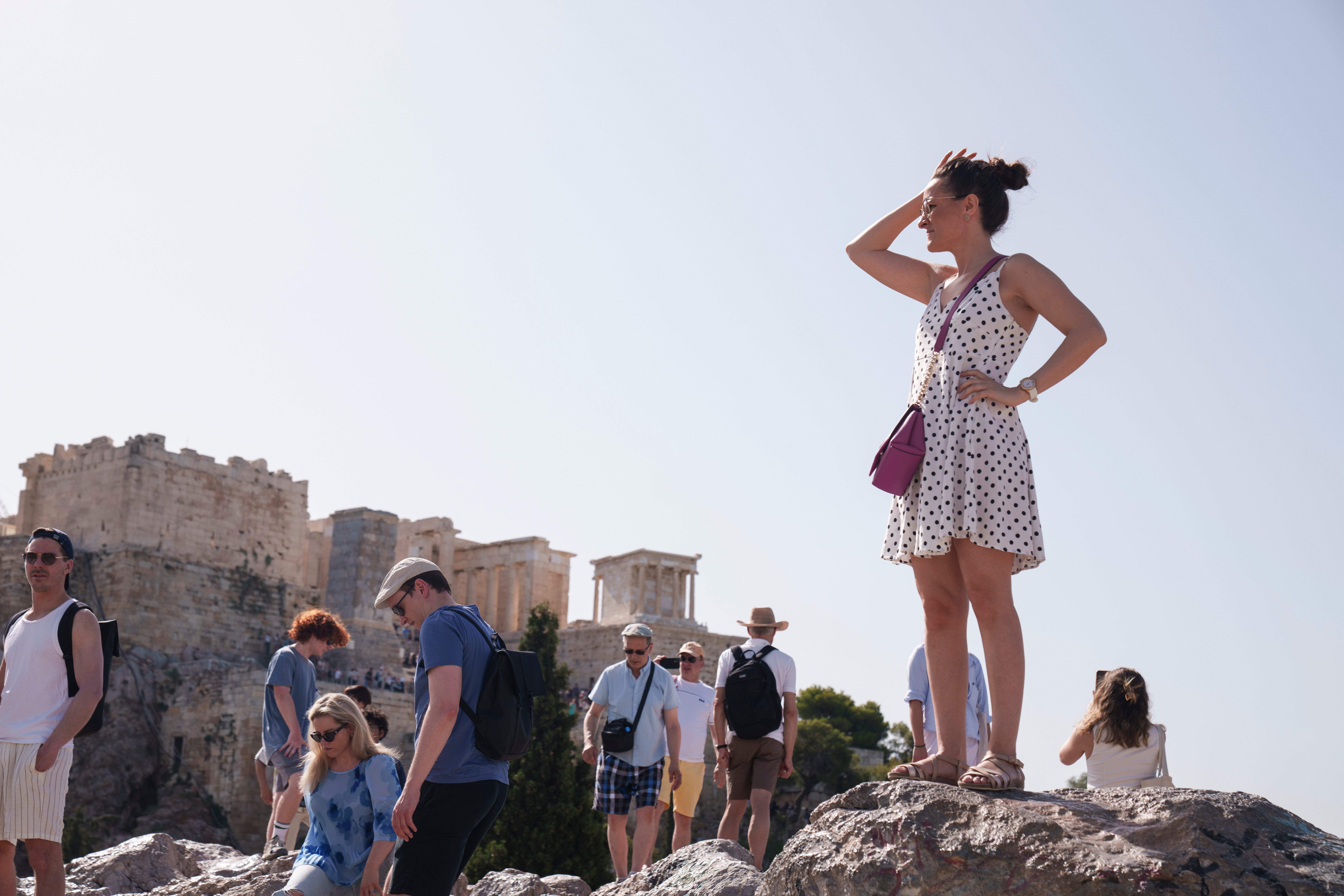 Tourists standing in the heat in Athens