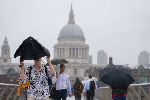 <p>A rainy April put a dampener on the UK’s economic growth (Dominic Lipinski/PA)</p>