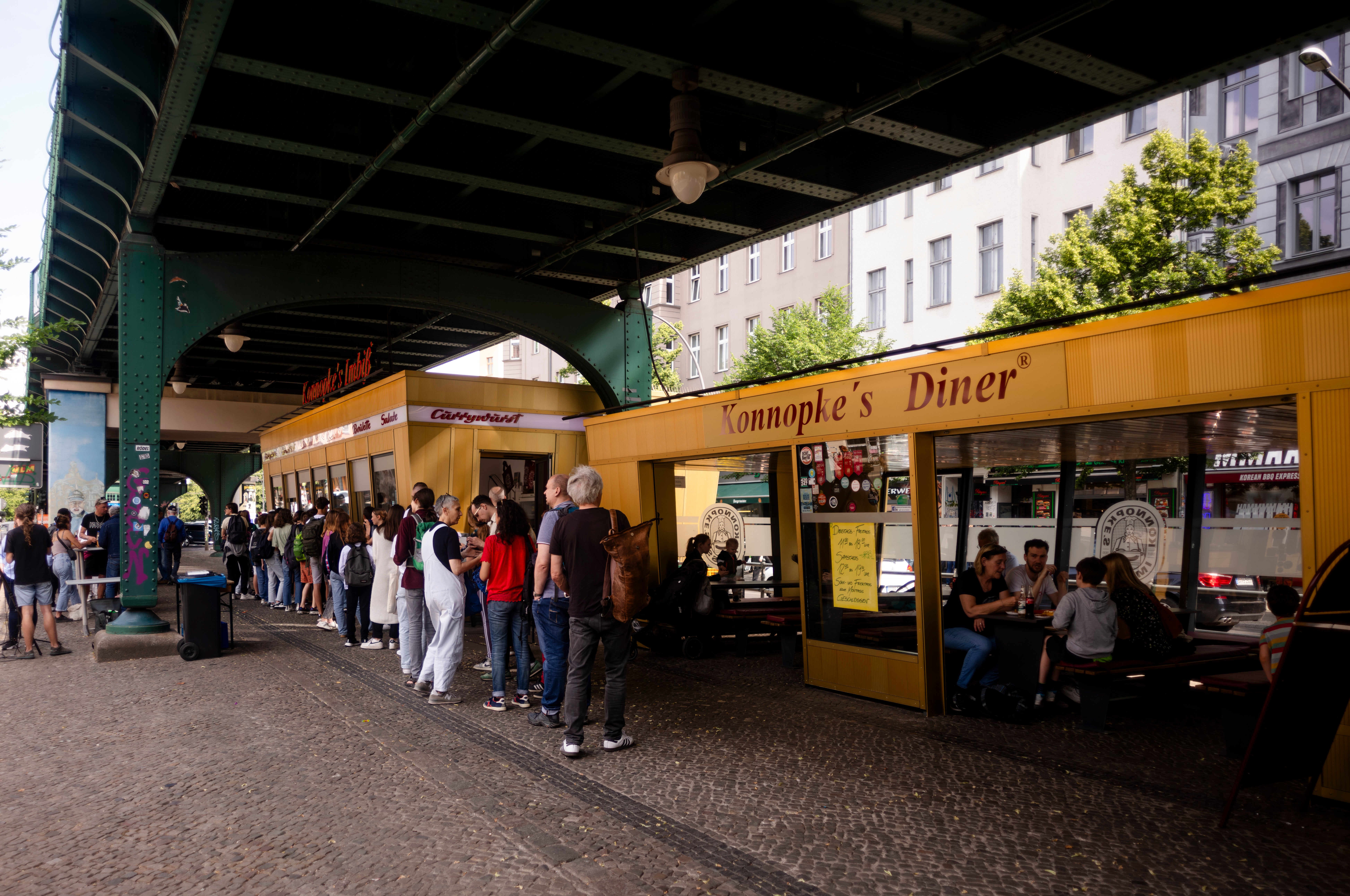 At Konnopke’s Imbiss, a fast food restaurant under the tracks at Eberswalder Straße subway station
