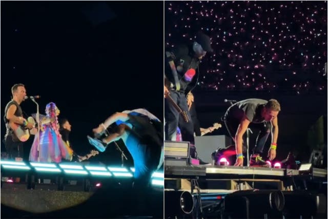 <p>A man attempts to climb onto the stage during Coldplay’s gig in Athens, Greece</p>