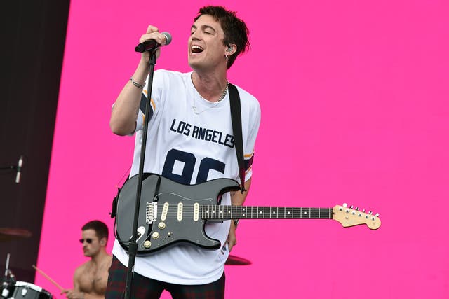 <p>Paul Jason Klein of LANY performing at Coachella in 2018</p>