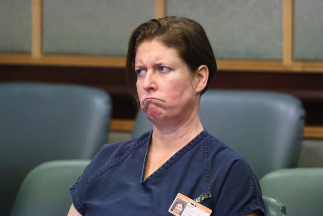 <p>Defendant Sarah Boone listens to her court-appointed attorney Patricia Cashman during a  pre-trial hearing in Orlando, Florida on June 7. Cashman has asked to withdraw from the case </p>