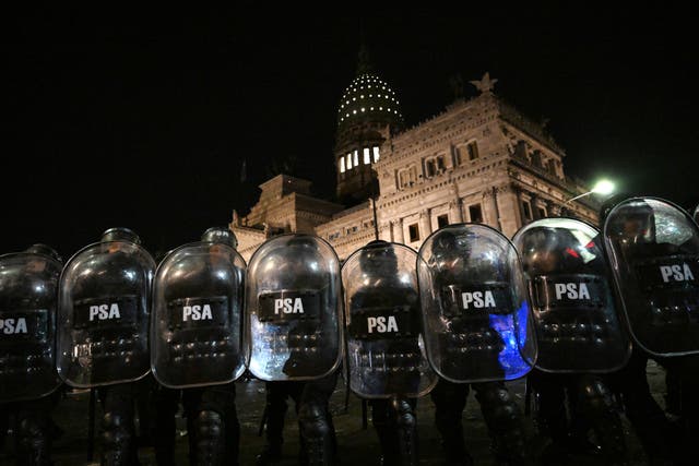 <p>Anti-riot police guard the surroundings of the National Congress during a protest in Buenos Aires on 12 June 2024</p>