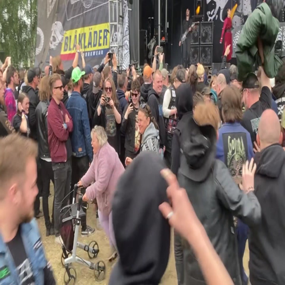 Elderly woman with walker leads mosh pit at heavy metal music festival |  Culture | Independent TV