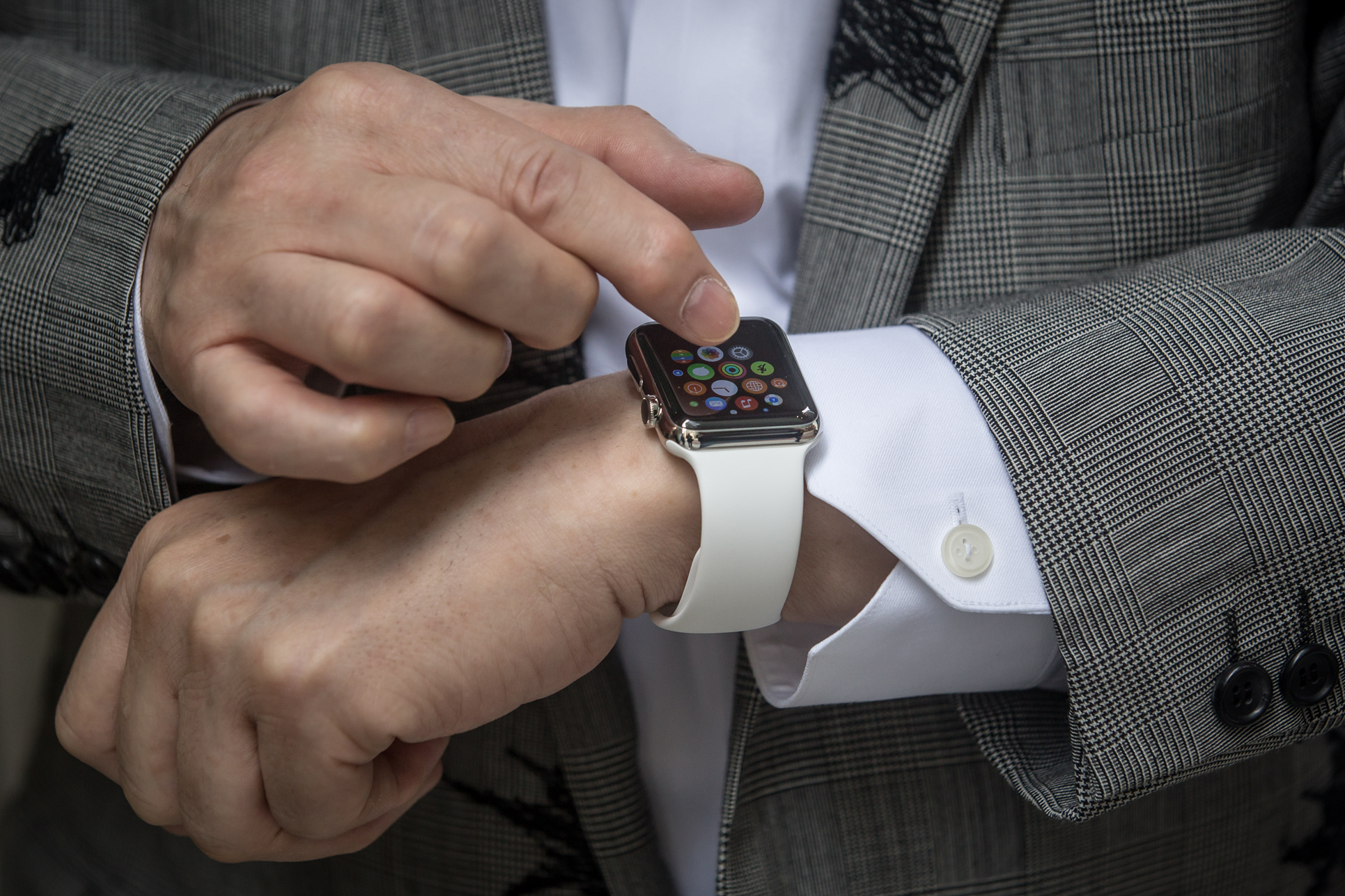 Hajime Shimada shows off his newly purchased Apple Watch outside boutique store, Dover Street Market Ginza on 24 April, 2015 in Tokyo, Japan