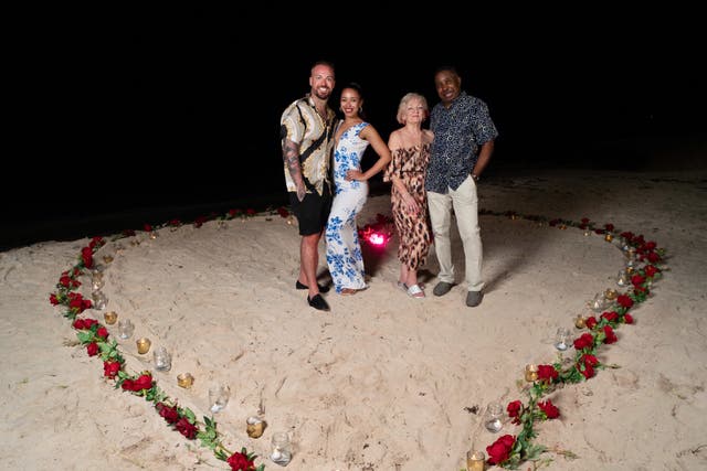 <p>Adam, Victoria and Victoria's parents after the proposal (Ryan Alleyne/PA Real Life)</p>