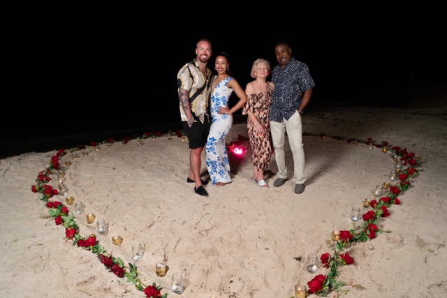 <p>Adam, Victoria and Victoria's parents after the proposal (Ryan Alleyne/PA Real Life)</p>