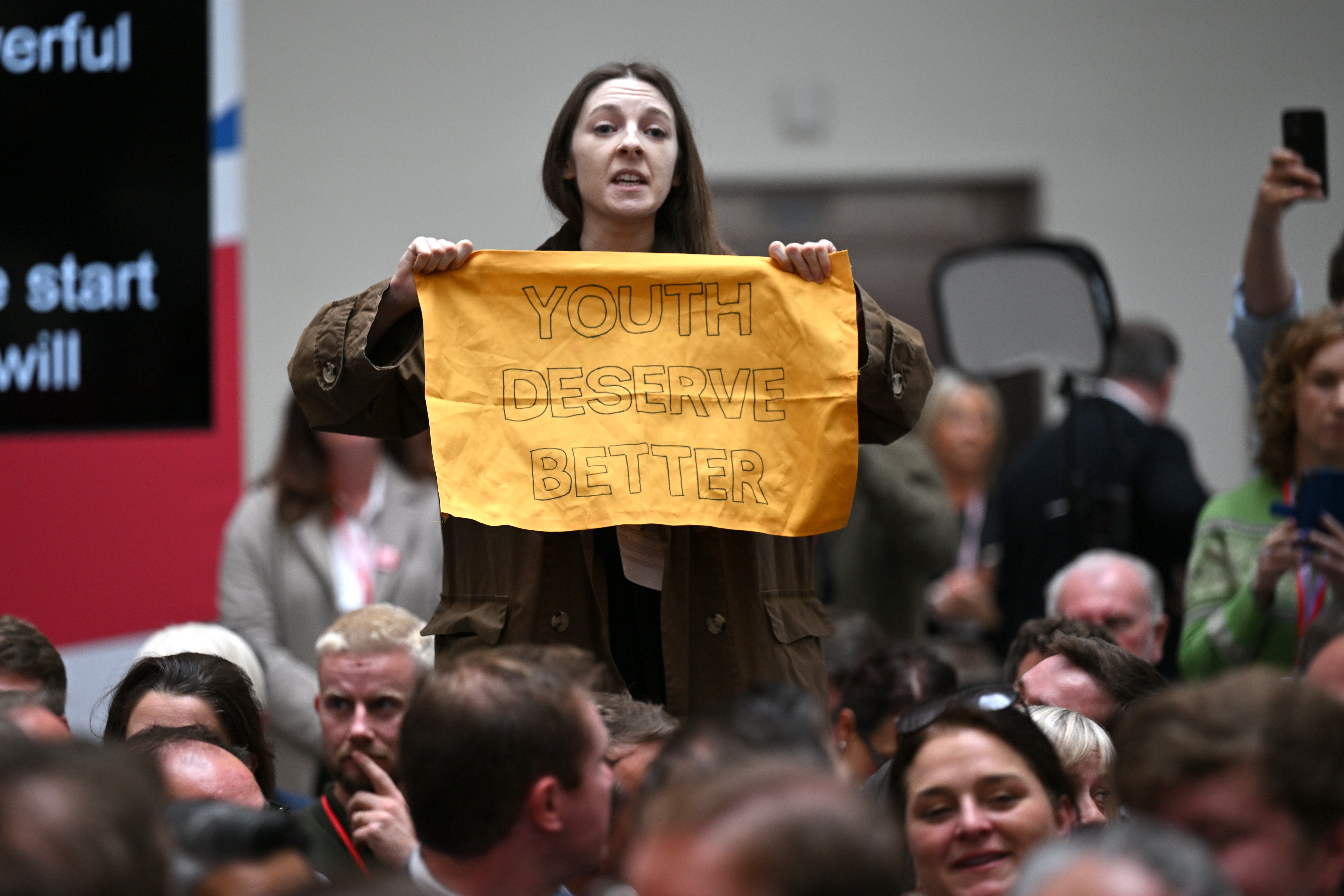 The protester was quickly removed from the event in Greater Manchester after claiming Labour’s manifesto pledges were the ‘same old Tory policies’