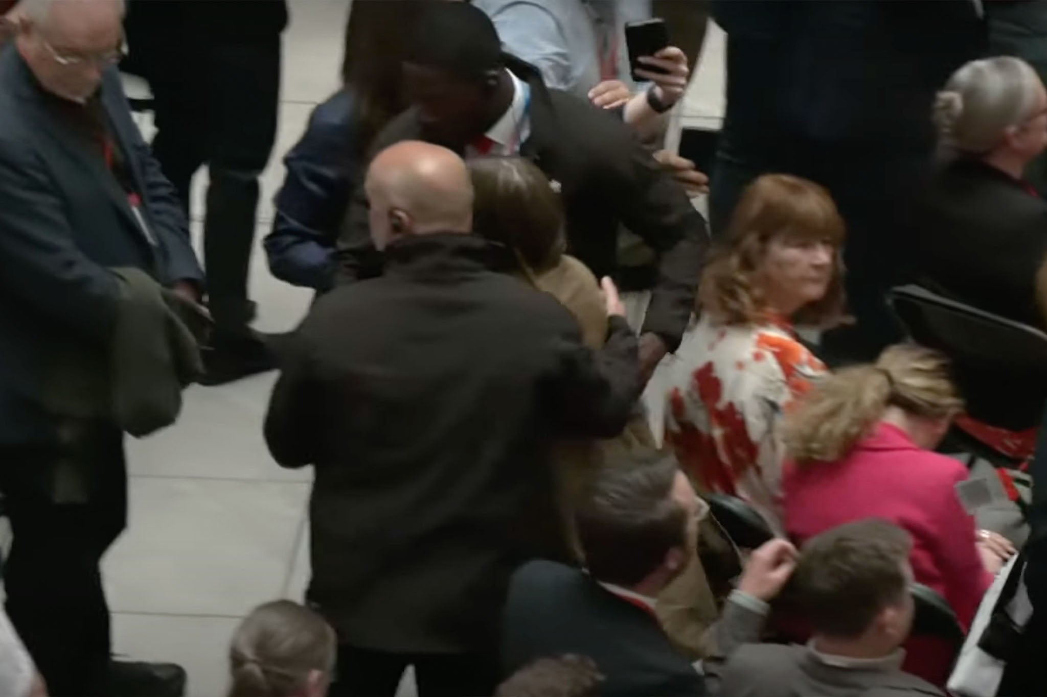The protester being removed from the launch event in Greater Manchester on Thursday