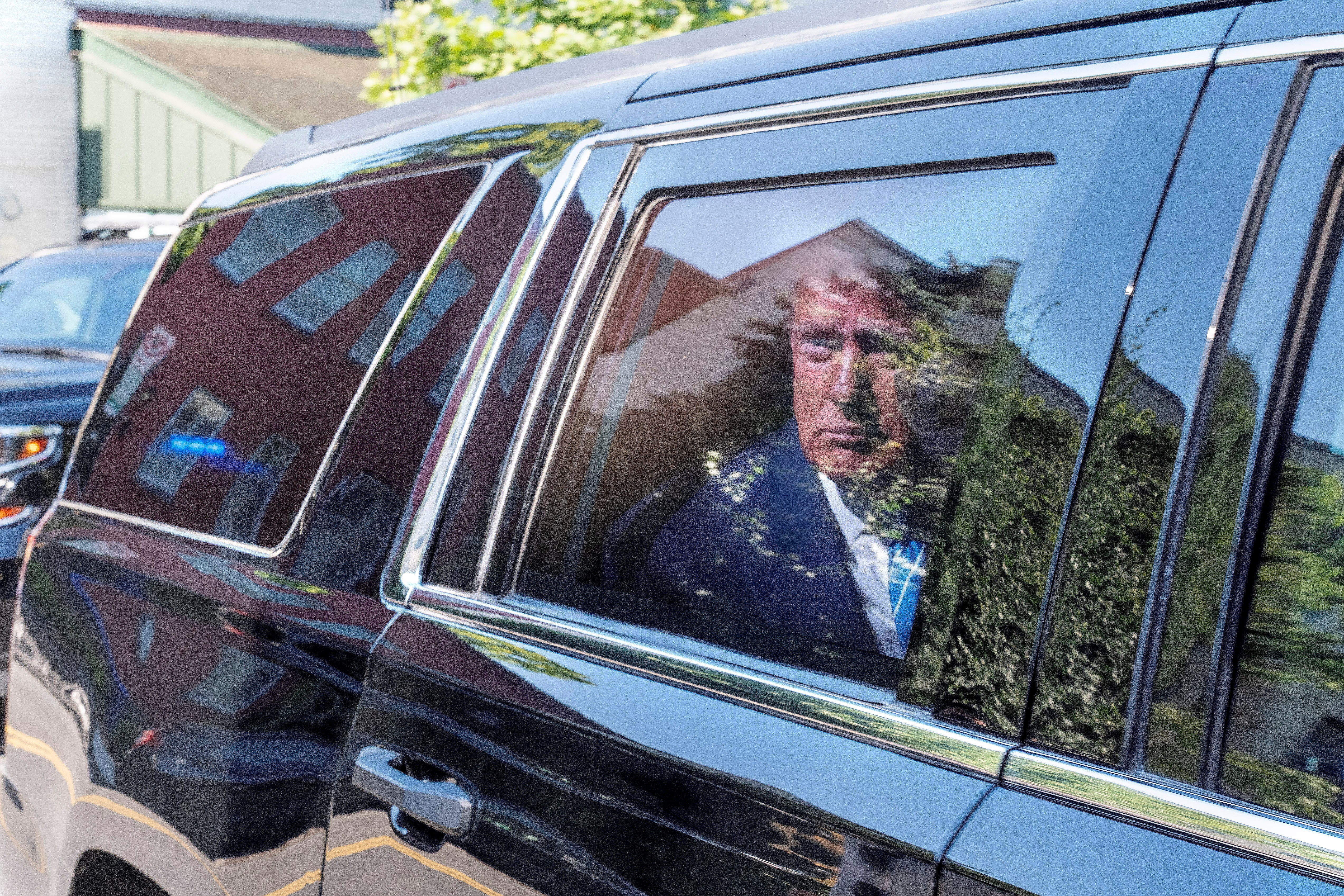 Former President Donald Trump arrives at the Capitol Hill Club, on Thursday, June 13, 2024, in Washington