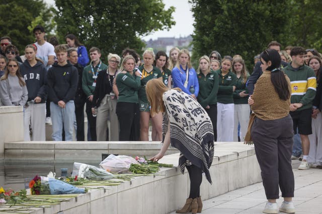 Floral tributes being laid during a memorial event at the University of Nottingham to mark the first anniversary of three people stabbed to death by Valdo Calocane (Joseph Raynor/Reach PLC/PA)