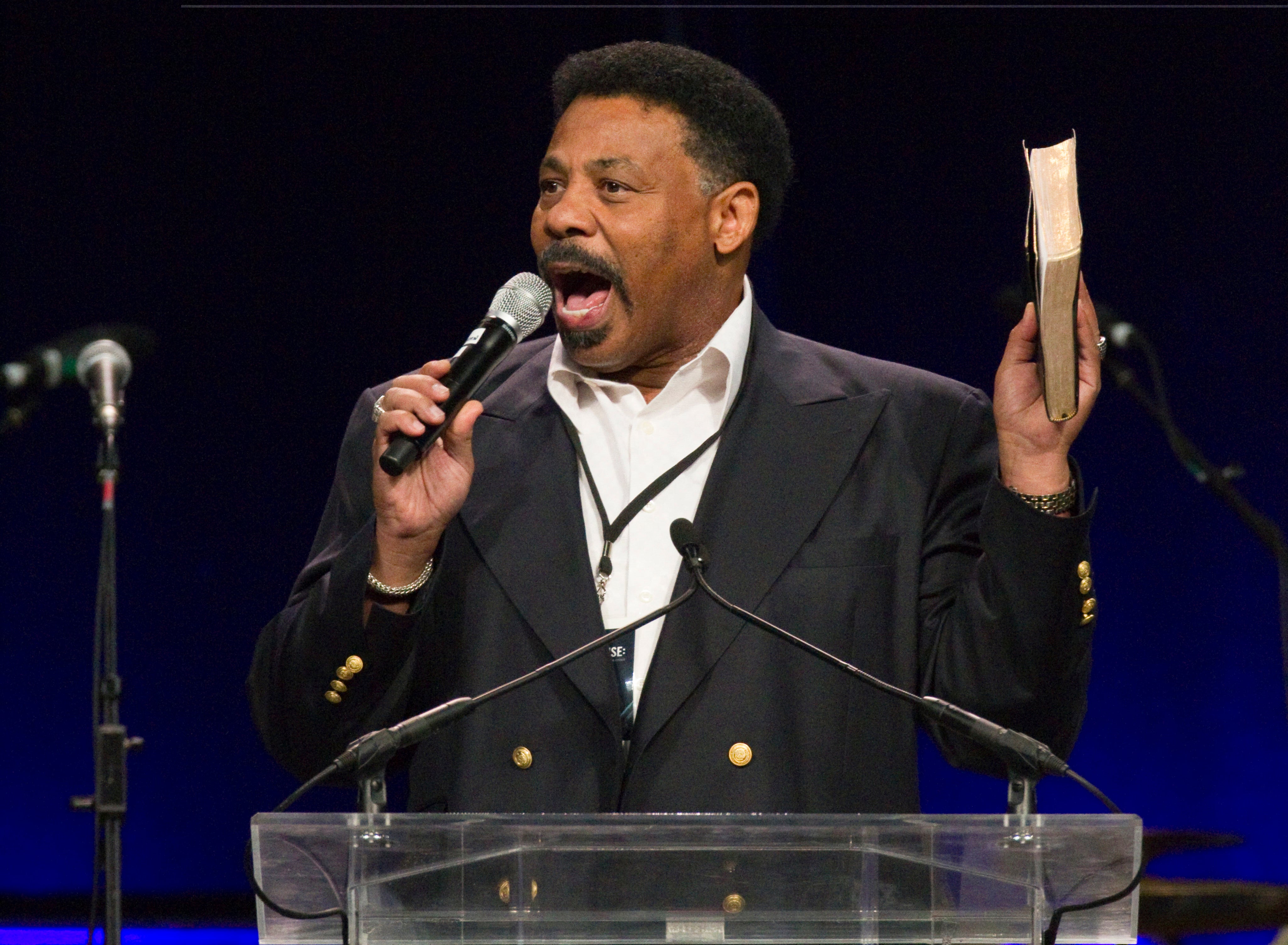 Tony Evans speaks at The Response, a day-long "call to prayer for a nation in crisis," at Reliant Stadium in Houston. He left the church he led for nearly 50 years, leaving his family and the public with few details about why.